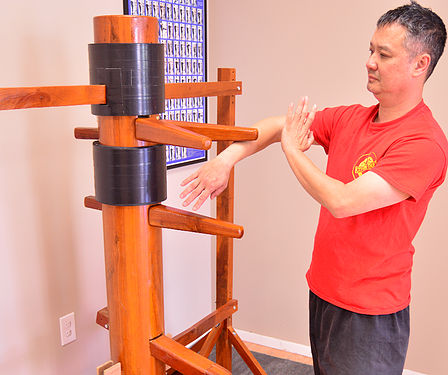 Wing Chun Wooden Dummy Training Fighting Techniques with Sifu Ryan Leung